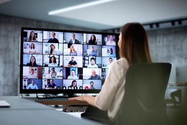 Female HR professional setting up online webinar