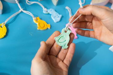 Creator is using white air dry clay for making decor to...