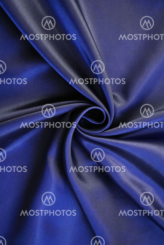 Smooth elegant dark blue silk as background