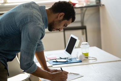Concentrated man working in office