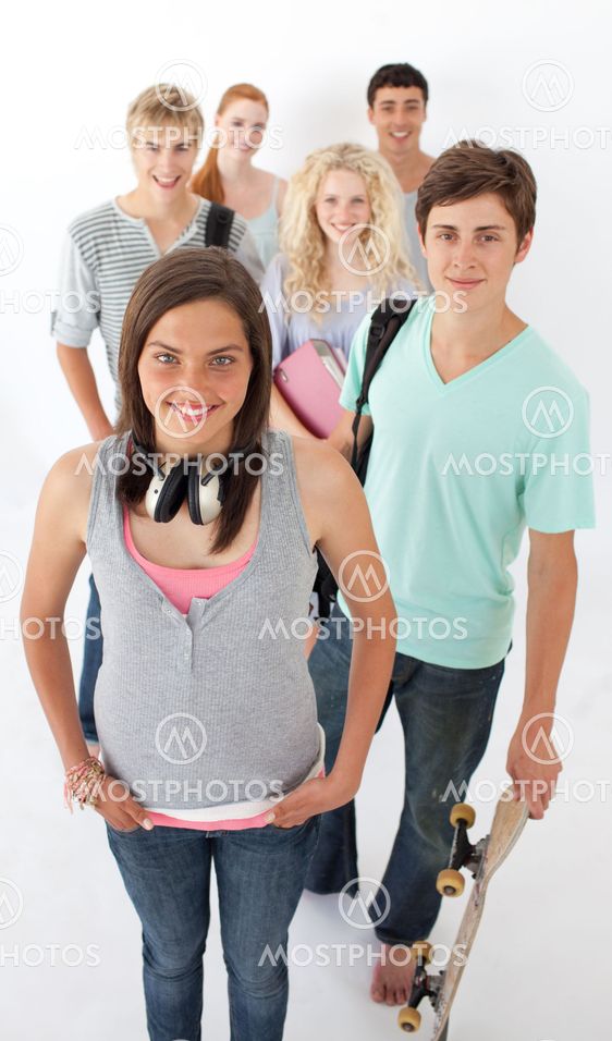 Happy teenagers smiling at the camera