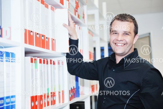 male adult in archive library