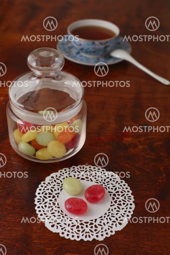 Tea with coloured sugar candies
