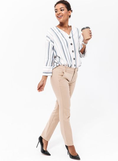 Full length portrait of a smiling young african...