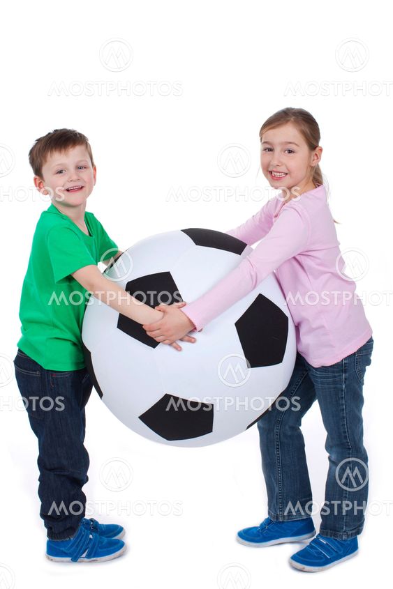 Boy and girl with huge soccer ball( mixed )