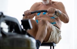 Staying fit and healthy. Senior shirtless man with an EKG...