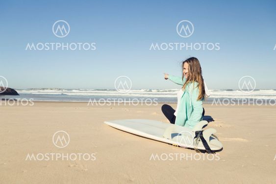Teen girl surfing