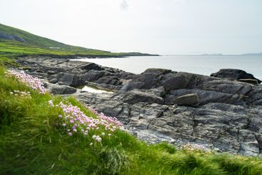 Rough rocky shore along famous Ring of Kerry route....