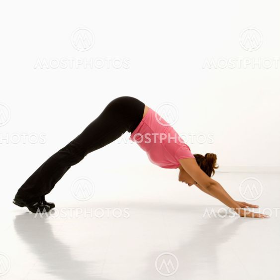 Woman practicing yoga.