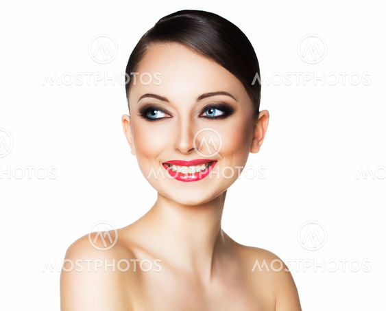 Portrait of a beautiful woman with a glamorous retro makeup