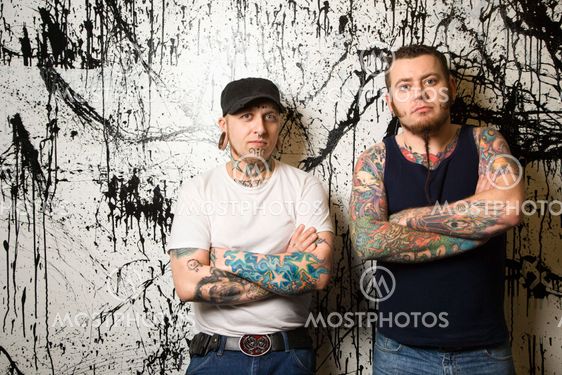 Tattooed men.