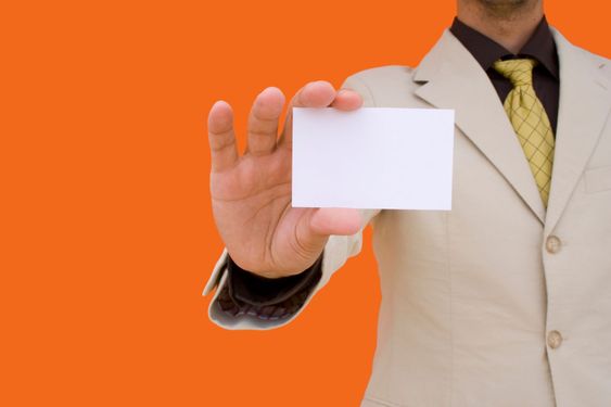 Businessman showing his card