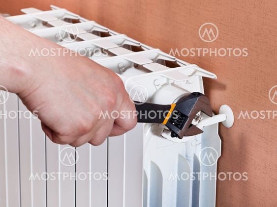 adjusting heating radiator