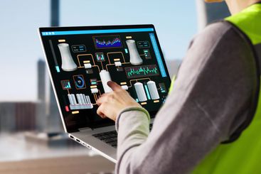 Female Operator Monitoring SCADA System