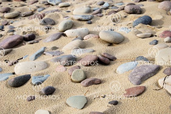 Untouched sandy beach with pebbles