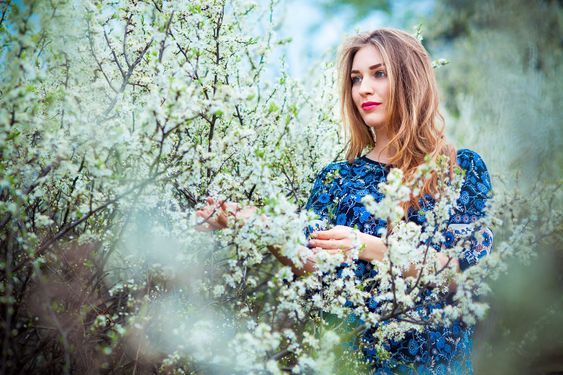 beautiful blond woman in the park on a warm spring day