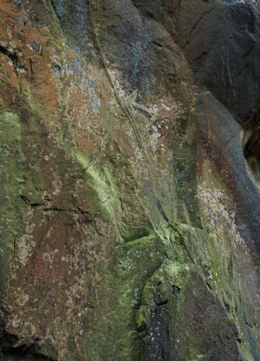 Large rocky rocks. Rocks of rocks. Gray moss-covered rocks