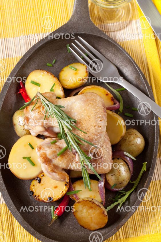 Roasted chicken wings and potatoes