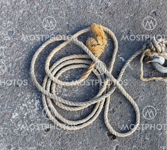 Rope made of hemp laying on the bridge