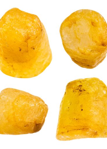 samples of raw yellow sapphire minerals isolated