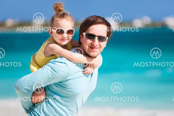Father and daughter at beach