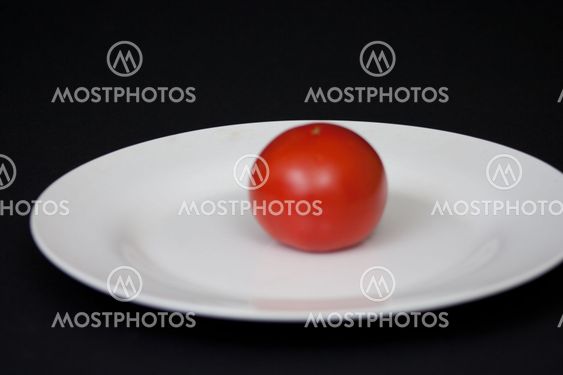 Red Tomatoe on a Plate
