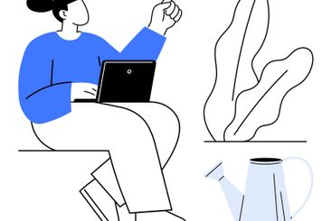 Woman with laptop gesturing while sitting near a plant...