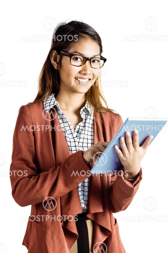 Smiling businesswoman with eyeglasses using a tablet