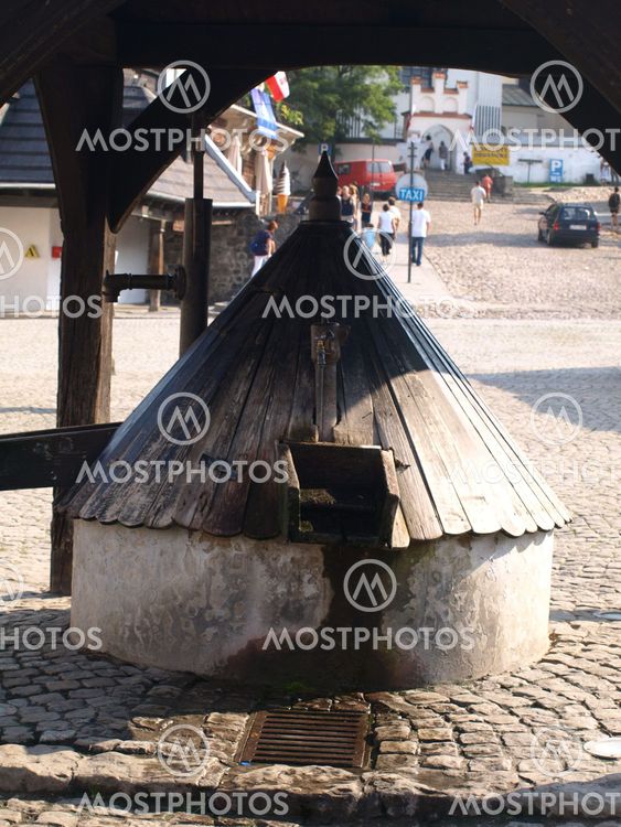 Old wooden well in Old Market Place in Kazimierz Dolny, Poland
