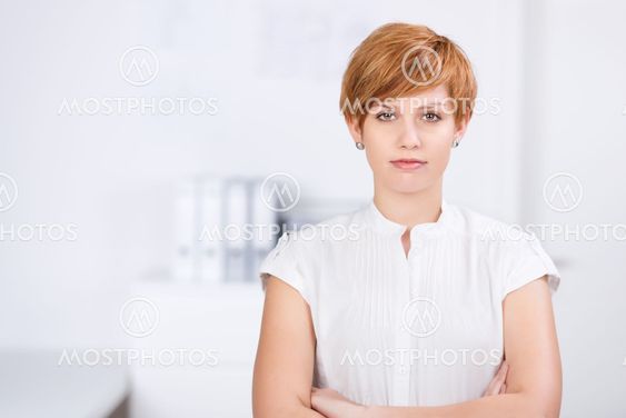Attractive Businesswoman Standing Arms Crossed