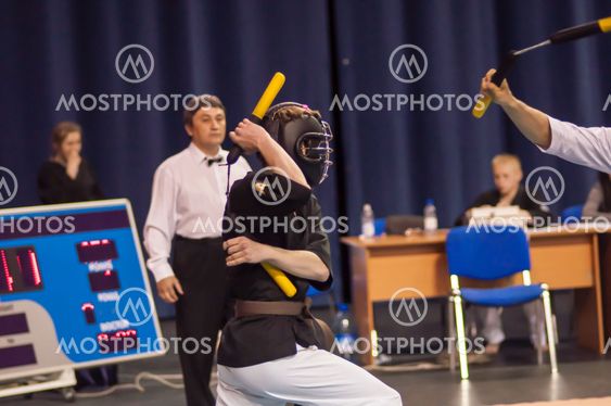 Kobudo competition men with nunchaku