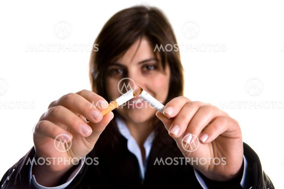 young woman breaking cigar - anti-tobaco concept