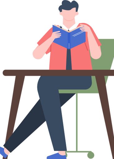 Concentrated male student or worker is sitting at the...