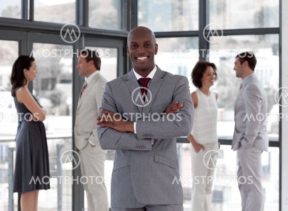 portrait of an afro male manager leading his team