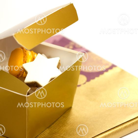 Cookies in a present box on a white background