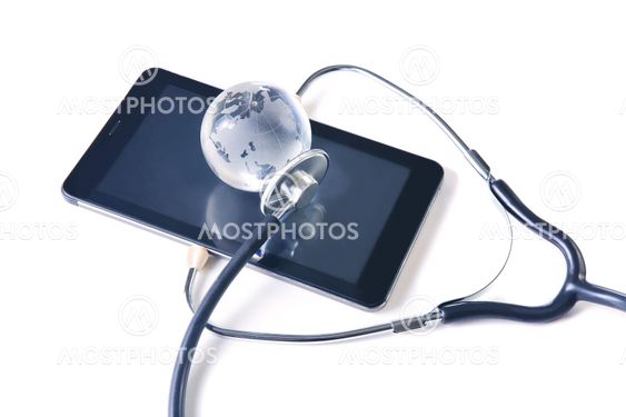 glass globe and stethoscope on the tablet