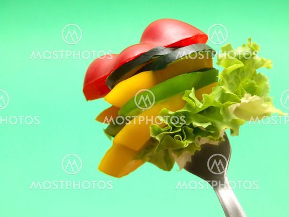 sliced vegetables on fork...