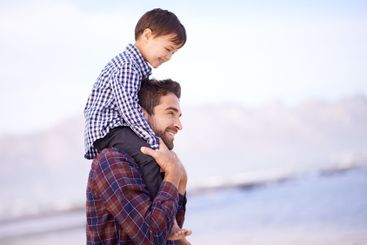 Beach, father and son on shoulder with smile, space and...