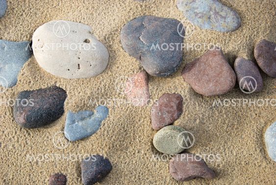 Untouched sandy beach with pebbles