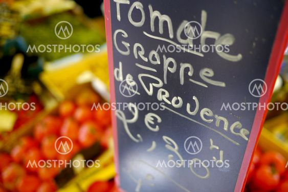 french sign in vegetable market
