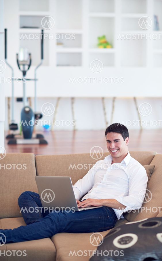 working on laptop computer from home