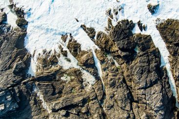 Rough and rocky shore at Malin Head, Ireland's...