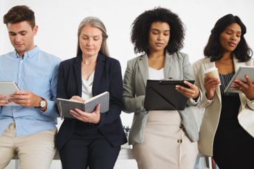 Technology, waiting or business people with tablet or...