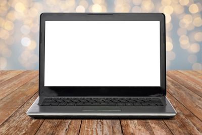 laptop computer with white screen over lights