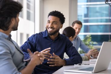 Positive African project manger man meeting with male...