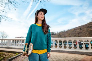 Portrait of a Young Caucasian woman holding a...