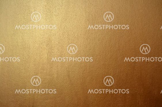 gold acrylic paint on a cardboard