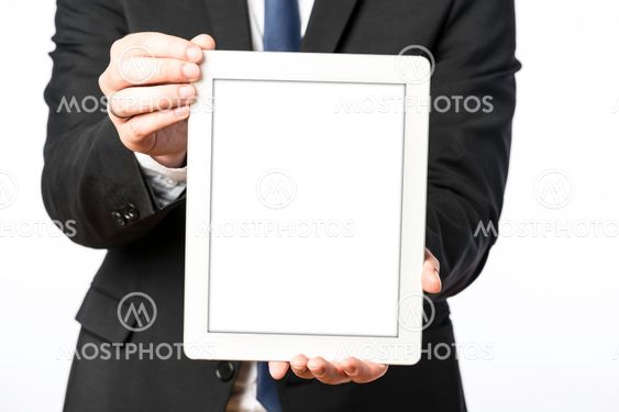 Business man shows his blank tablet computer