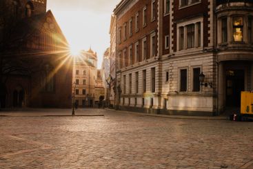 Sunlit European City Square with Historic Architecture
