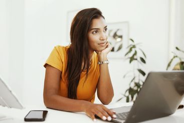 Remote work, thinking and laptop with woman in home...